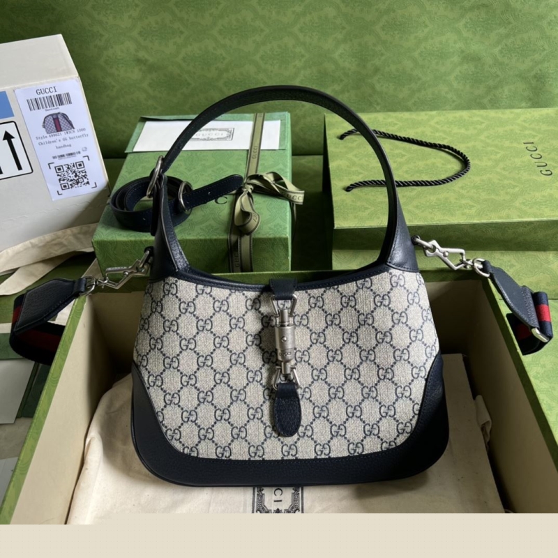 G*u*i top handle bags